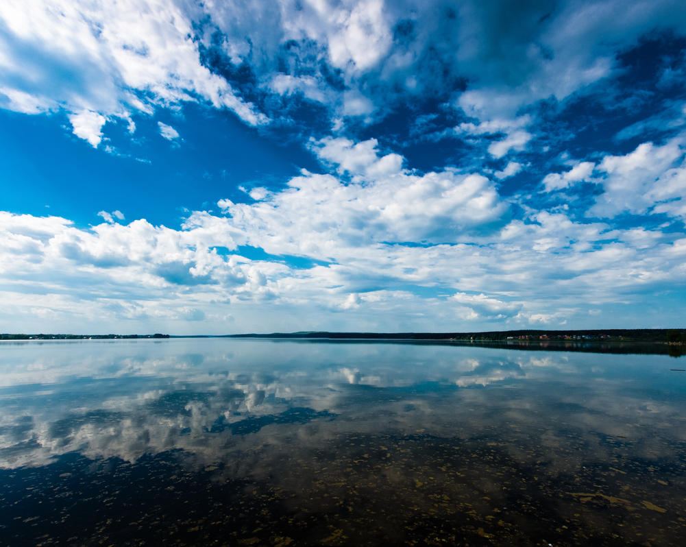 clouds_over_water_by_moitisse-d3is21n.jpg